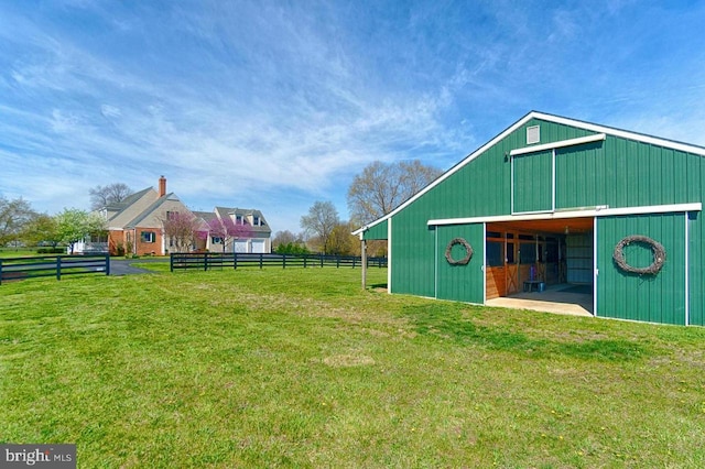 view of yard with an outbuilding