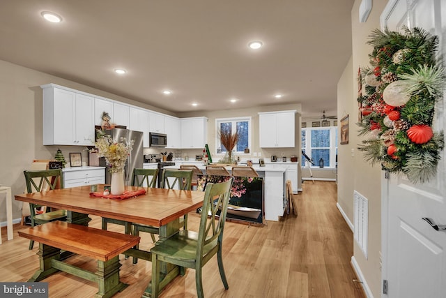 dining area featuring light hardwood / wood-style floors