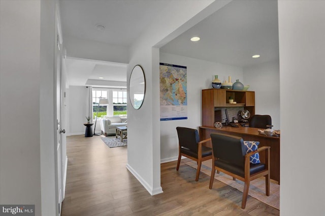 home office with light wood-type flooring