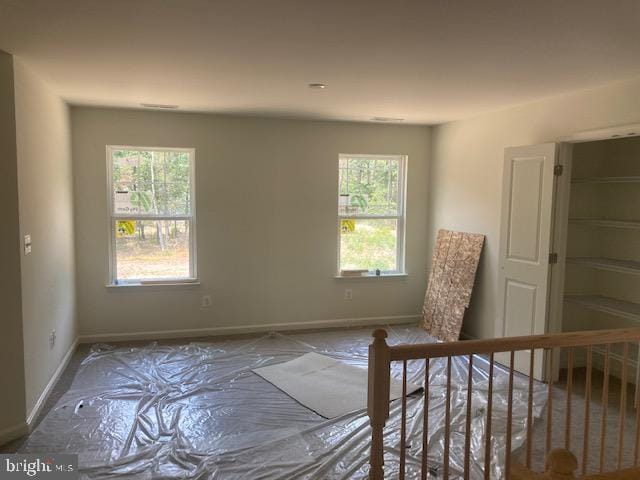 empty room featuring a wealth of natural light