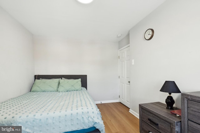 bedroom featuring light wood-type flooring