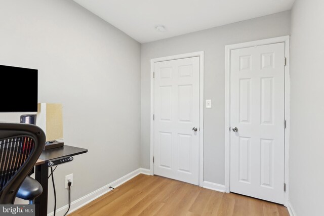 home office featuring light hardwood / wood-style flooring