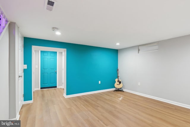 unfurnished room featuring light wood-type flooring