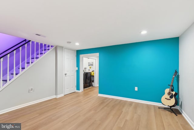 unfurnished living room featuring light hardwood / wood-style flooring