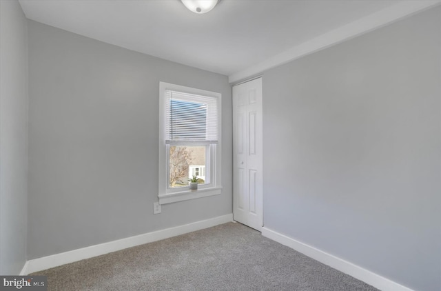 empty room with carpet floors