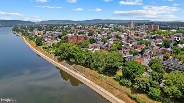 bird's eye view featuring a water and mountain view