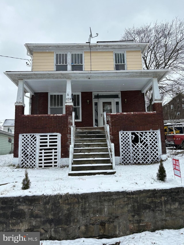 view of front of house with covered porch