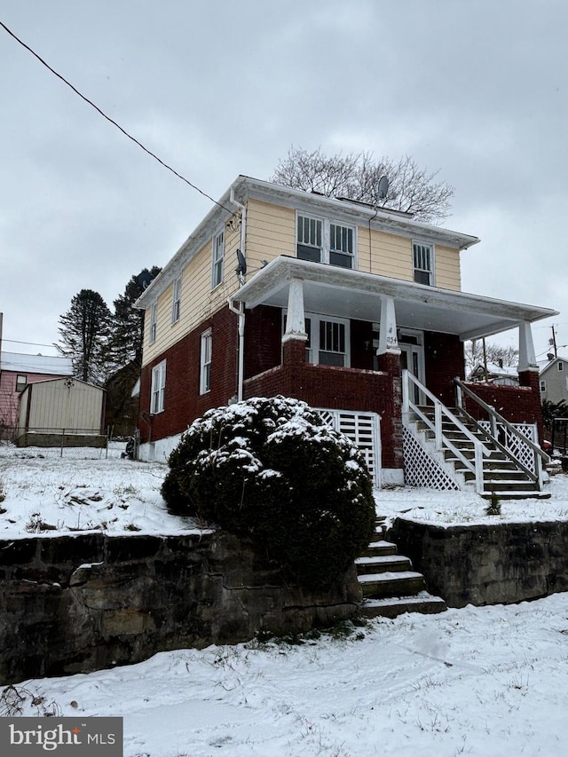 view of front property featuring a porch