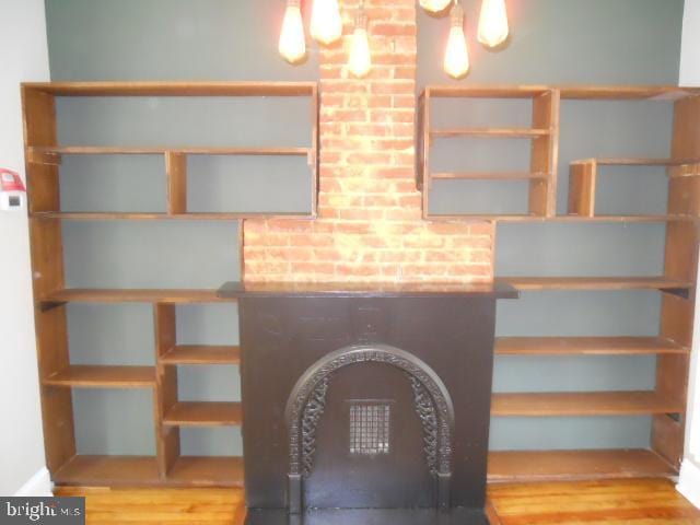 staircase featuring hardwood / wood-style flooring