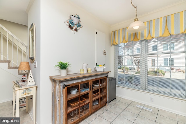 interior space featuring crown molding