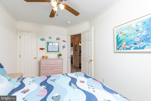 bedroom featuring crown molding and ceiling fan