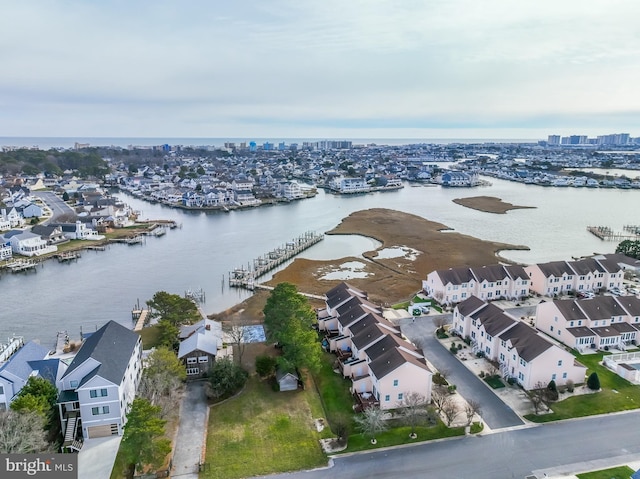 bird's eye view with a water view