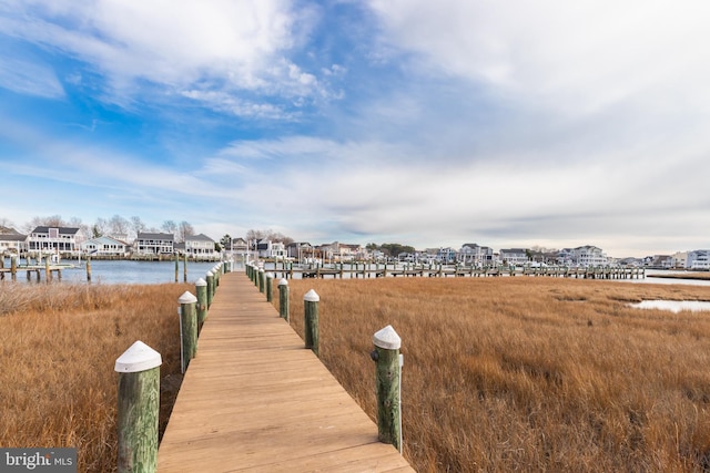 dock area featuring a water view