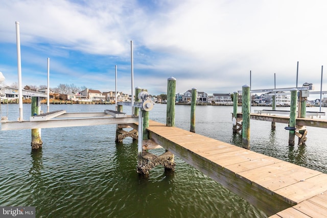 dock area featuring a water view