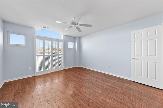 unfurnished room with hardwood / wood-style floors and ceiling fan