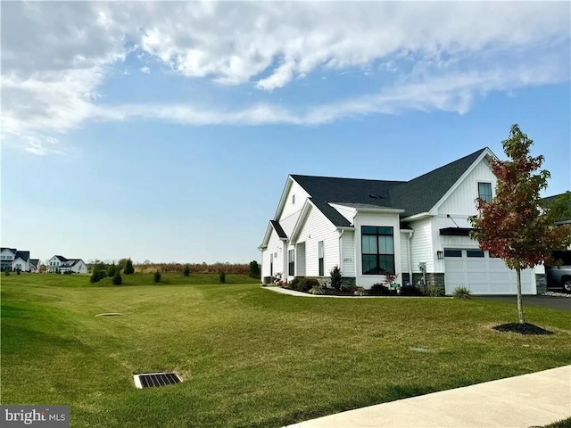 view of side of home featuring a yard