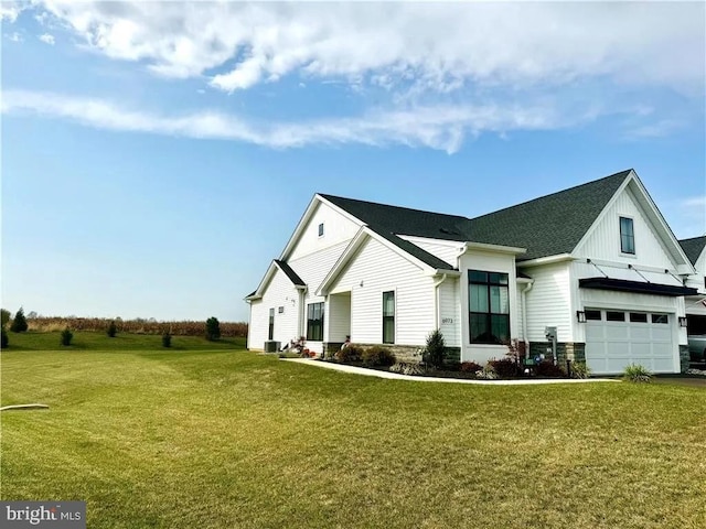 modern farmhouse featuring central AC and a front lawn