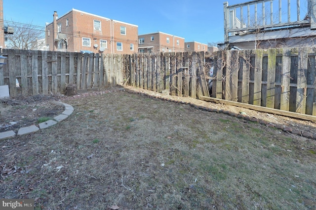 view of yard featuring a fenced backyard