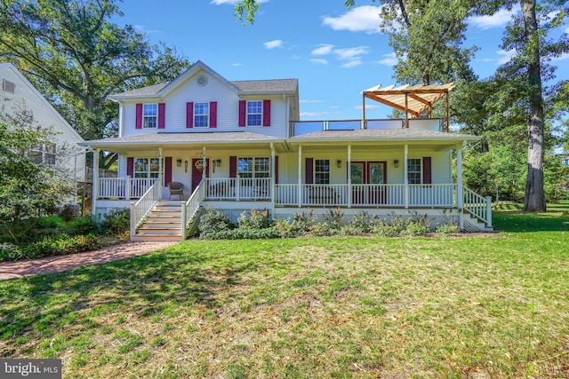 view of front of house with a porch and a front yard