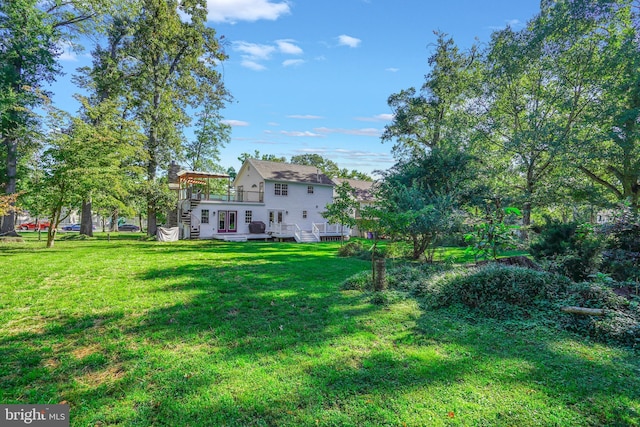 view of yard featuring a deck