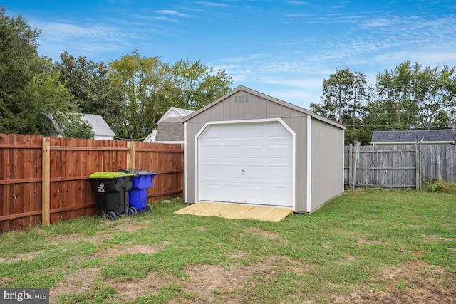 garage with a lawn