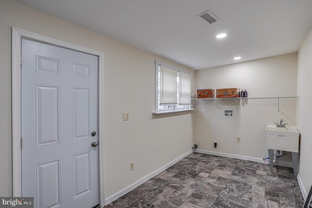 laundry room with hookup for an electric dryer and hookup for a washing machine