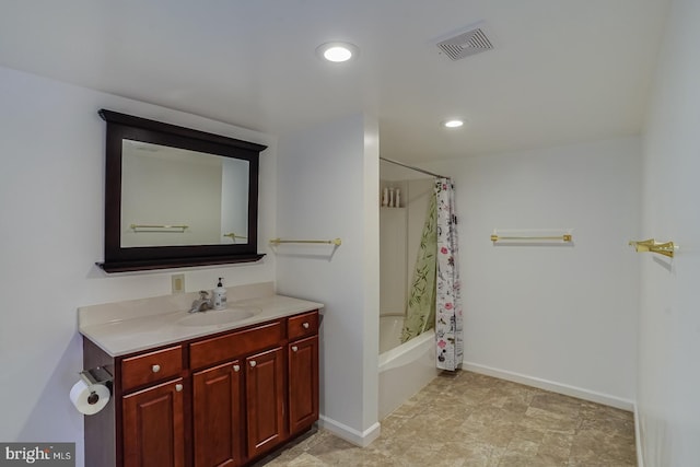 bathroom featuring vanity and shower / bath combo with shower curtain