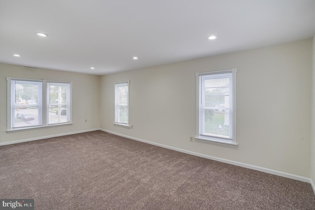 view of carpeted spare room