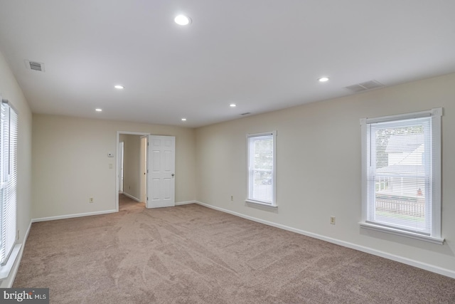 view of carpeted spare room