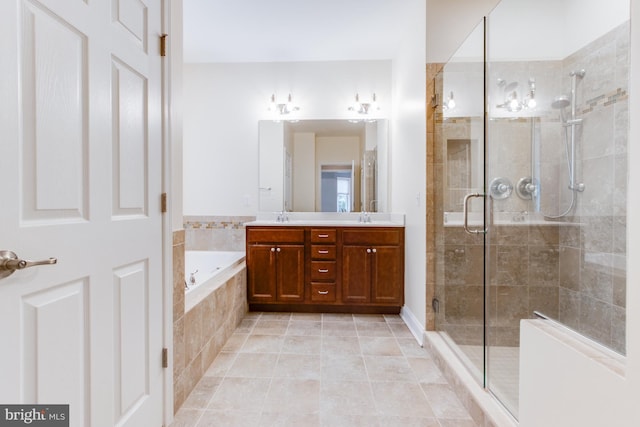 bathroom with vanity, tile patterned floors, and independent shower and bath