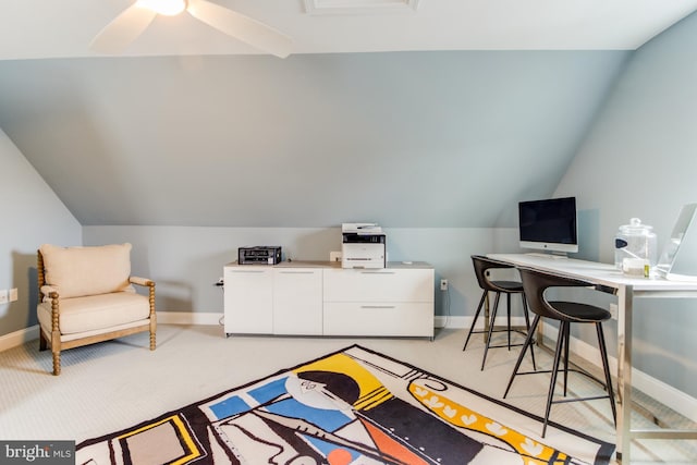 office with light carpet, ceiling fan, and vaulted ceiling