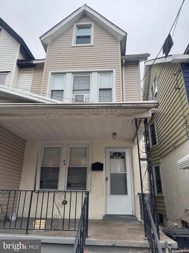 doorway to property with a porch