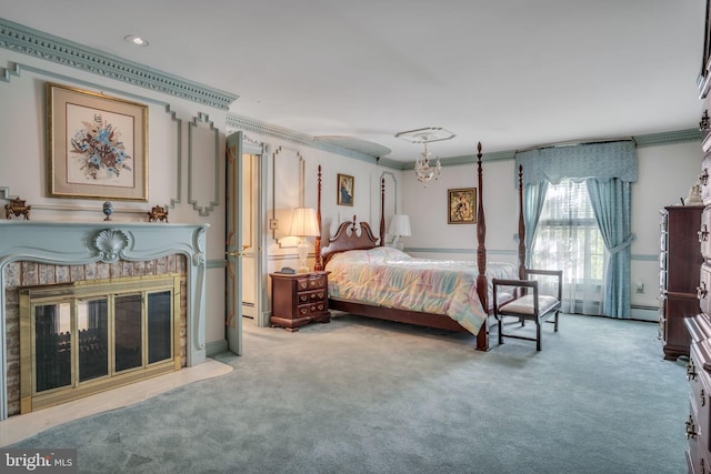 bedroom with crown molding and carpet floors