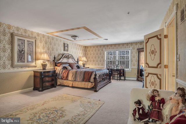 carpeted bedroom with a baseboard radiator