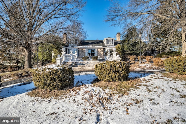 view of snow covered house