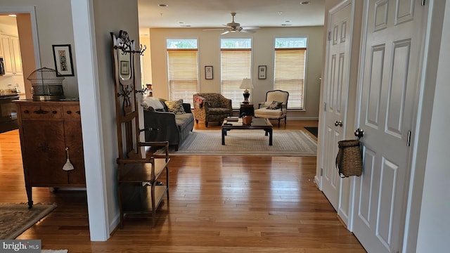 interior space featuring ceiling fan and hardwood / wood-style floors