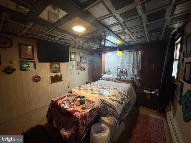 bedroom featuring a baseboard radiator and coffered ceiling