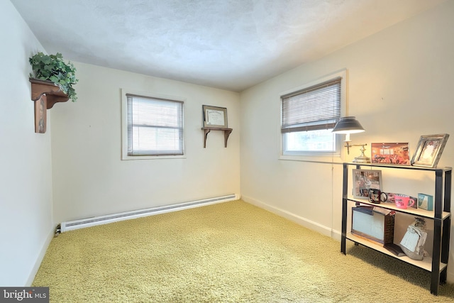 interior space featuring carpet floors and a baseboard radiator