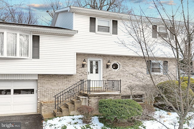 view of front of home featuring a garage