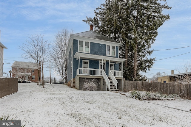 view of front of home featuring covered porch