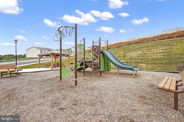 view of jungle gym featuring a gazebo