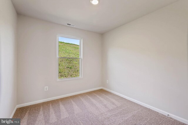 empty room with carpet floors