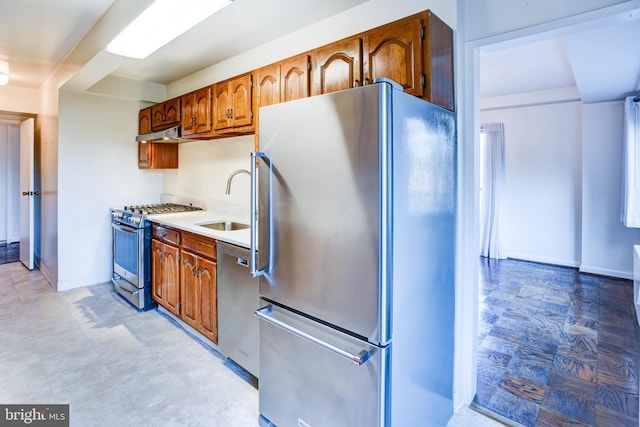 kitchen featuring stainless steel appliances and sink