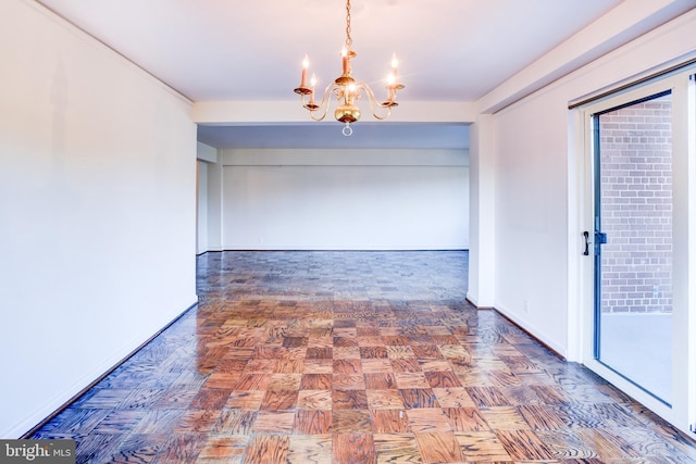 unfurnished dining area featuring parquet flooring and a notable chandelier