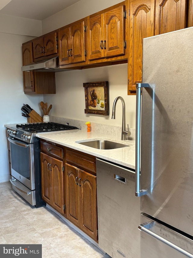 kitchen featuring appliances with stainless steel finishes and sink