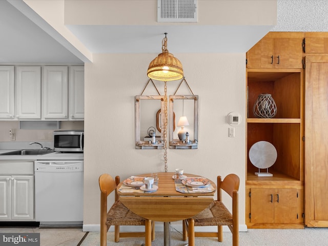 dining room with sink