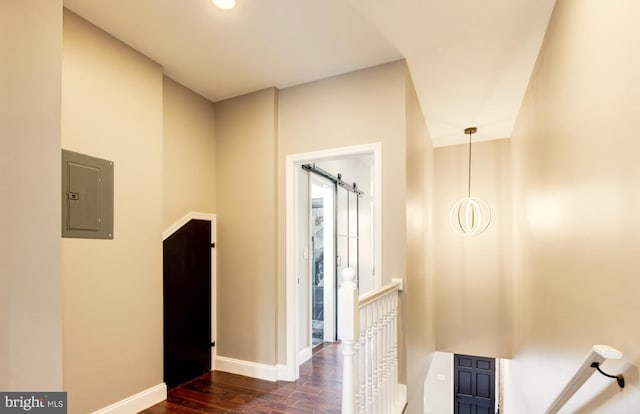 1324 Aisquith St, Baltimore, MD 21202 - hallway featuring an upstairs landing, electric panel, dark wood-style flooring, and baseboards