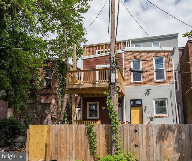 1324 Aisquith St, Baltimore, MD 21202 - view of front of property featuring a balcony and brick siding