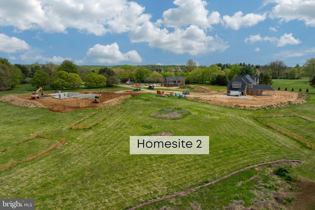 view of yard with a rural view