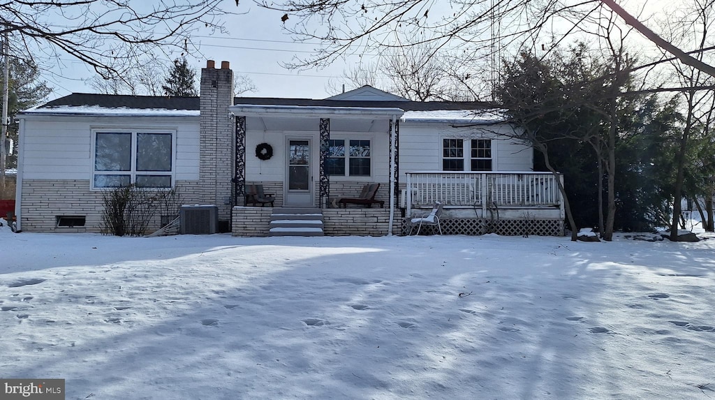 view of front of property with central air condition unit